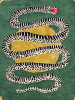 Decorative rug with a snake design on a green background