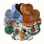 The Scalloped Meadow Hand Tufted Round Rug showcases a vibrant floral design, perfect for adding a touch of nature to any living room. This wool area rug features an intricate blend of colors and patterns that make it an ideal large area rug for living rooms, measuring 8x10. Its scalloped edges and artistic floral motifs create a standout piece that combines beauty with functionality.