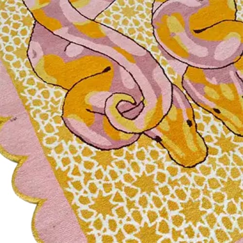 Vibrant and artistic hand-tufted area rug featuring a serpentine design in pink and yellow hues. Perfect for adding a touch of elegance to your bedroom or living room. This wool rug showcases intricate patterns and a scalloped edge, ideal for those seeking unique bedroom rugs or living room area rugs.