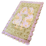 Scalloped Serpentine Duo Harmony hand tufted area rug featuring an abstract snake design with a delicate pink and beige color palette, perfect for bedroom or living room area rugs. The wool rug showcases a unique scalloped border that adds a charming touch to any Bedroom or Living room decor.