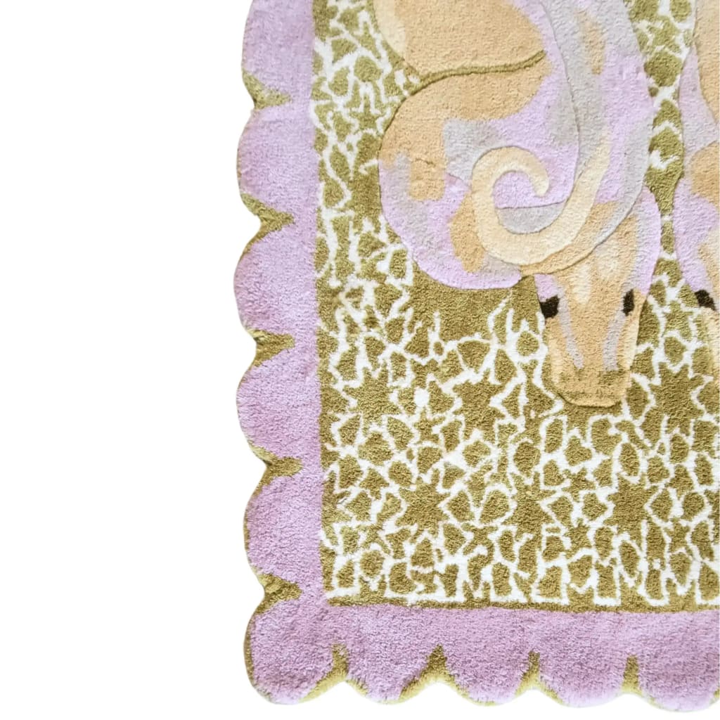 Close-up view of the Scalloped Serpentine Duo Harmony Hand Tufted Rug, showcasing its intricate design and soft texture. This wool area rug features a unique scalloped edge and abstract patterns, perfect for adding a touch of elegance to your bedroom or living room.