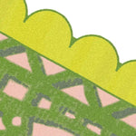 Close-up view of the Scalloped Yellow Flower Mazed Hand Tufted Area Rug, showcasing its intricate pattern with green and pink geometric shapes and yellow scalloped border. Perfect wool rug choice for living room spaces, available in 8x10 size.