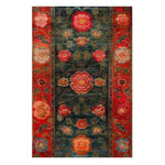 The Scarlet Blossom Heritage Hand Tufted Area Rug showcases a vibrant floral design, perfect for enhancing any dining room or living room. This wool rug features rich red, green, and pink hues, creating an inviting atmosphere as a dining room carpet or a floral rug centerpiece.