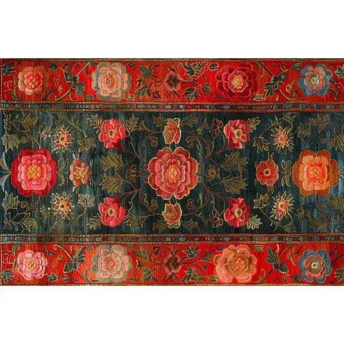 A stunning Scarlet Blossom Heritage Hand Tufted Area Rug featuring vibrant floral patterns in rich reds and greens, perfect for enhancing the elegance of your dining room or living room. This wool rug adds a touch of timeless beauty to dining room carpets and living room and dining room rugs collection.