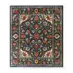 The Scarlet Grove Hand Knotted Area Rug features an intricate floral design, reminiscent of vintage Persian rugs. Perfect for adding elegance to any living room, this 8x10 rug showcases vibrant red, blue, and beige hues, blending traditional and modern aesthetics for a stunning centerpiece.