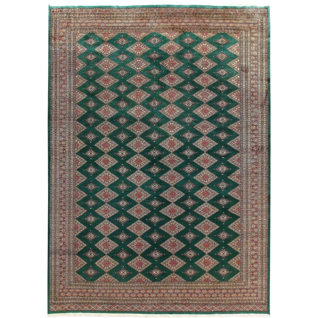 This stunning Sea Green Sarong Hand Knotted Area Rug showcases an intricate geometric pattern, ideal for large living room spaces. The harmonious blend of green and earthy tones adds a touch of elegance and warmth to your home decor.