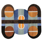 This striking area rug features a contemporary design with bold geometric patterns in shades of brown, blue, and orange. Hand-tufted from wool, it's perfect for adding a modern touch to your living room. Sized 8x10, this wool rug combines style and comfort, making it an ideal choice for contemporary homes.