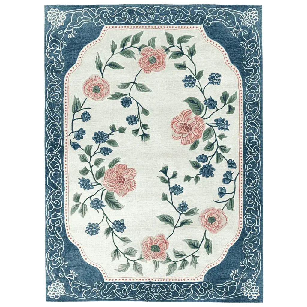 The Serenade of Blooms Hand Tufted Rug is a stunning area rug featuring a delicate floral design with pink and blue blossoms on a cream background, bordered by an intricate blue pattern. Perfect for adding elegance to living rooms, this wool rug combines style and comfort, making it an ideal choice for area rugs in living room settings.