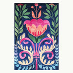 Vibrant Serenade of Mexico hand tufted area rug featuring a bold floral design. Ideal for adding a touch of elegance to dining rooms or bedrooms, this wool rug showcases a colorful pattern perfect for dining room carpets or as a floral rug in a cozy bedroom setting.