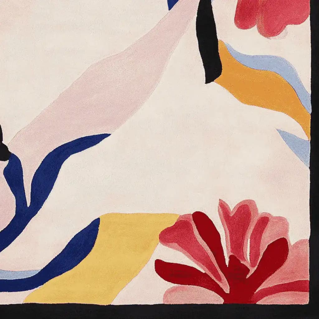 Close-up of the Serendipity Garden Hand Tufted Rug, showcasing its vibrant abstract design with bold red, blue, and yellow floral patterns. This contemporary wool rug is perfect for adding a touch of artistry to large living rooms. As a square area rug, it enhances the aesthetic appeal of any space, making it an ideal choice for those seeking stylish area rugs for living rooms.