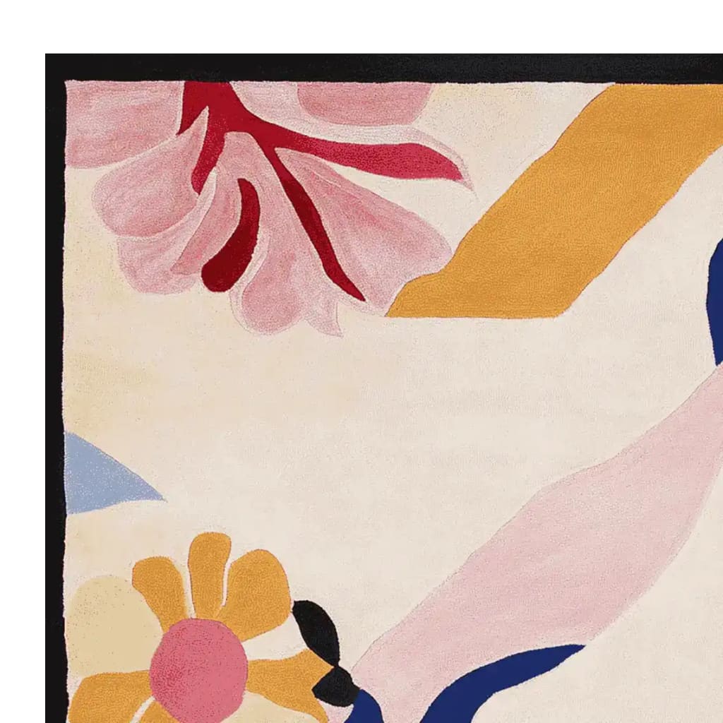 Close-up of the Serendipity Garden Hand Tufted Rug, showcasing vibrant abstract floral patterns in pink, yellow, and red hues. This contemporary wool rug is a perfect square area rug for large living room spaces, offering a stylish and colorful touch.