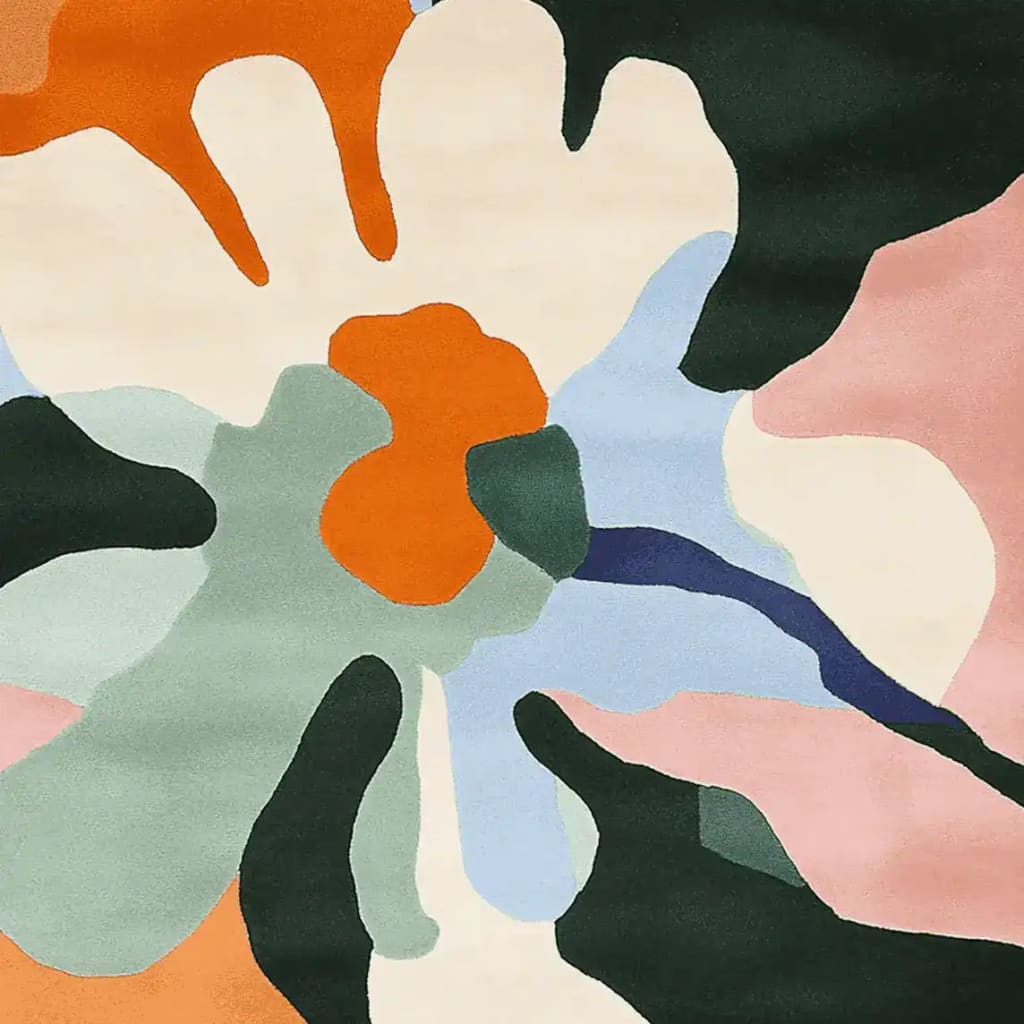 Beautiful abstract design of the Serene Flower Radiance Hand Tufted area rug, featuring bold, colorful shapes in a contemporary style. Perfect as a large living room rug, this wool square area rug offers a vibrant touch to any space.