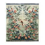 Serene Garden Tapestry Hand Knotted Area Rug featuring intricate floral designs with vibrant colors, perfect for enhancing living room decor. This large Persian-inspired floral rug showcases a detailed pattern with birds and blossoms, making it an ideal choice for those seeking elegant living room area rugs.