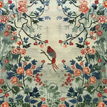 This beautiful hand-knotted area rug features an intricate floral design with vibrant blues and reds, perfect for enhancing any living room. The central motif of a detailed bird perched among blooming flowers adds a touch of elegance, making it an ideal choice for those seeking large living room rugs with a Persian flair.