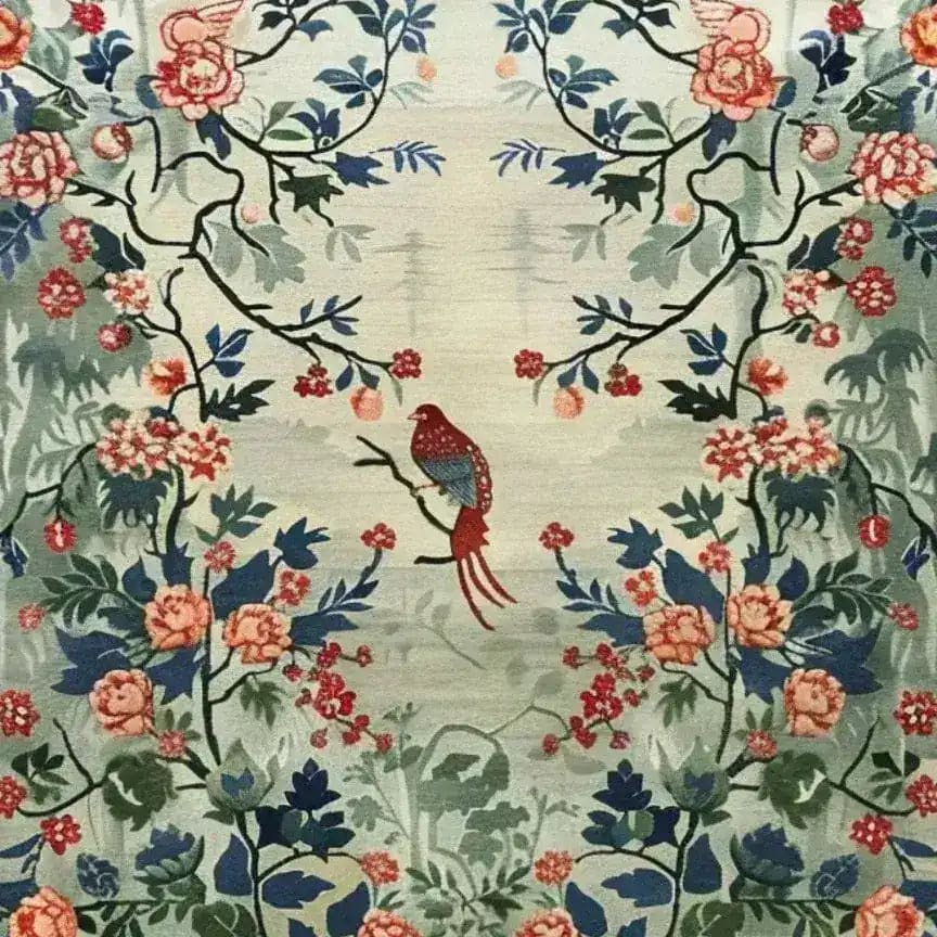 This beautiful hand-knotted area rug features an intricate floral design with vibrant blues and reds, perfect for enhancing any living room. The central motif of a detailed bird perched among blooming flowers adds a touch of elegance, making it an ideal choice for those seeking large living room rugs with a Persian flair.