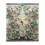 Serene Garden Tapestry Hand Knotted Area Rug featuring intricate floral designs with vibrant colors, perfect for enhancing living room decor. This large Persian-inspired floral rug showcases a detailed pattern with birds and blossoms, making it an ideal choice for those seeking elegant living room area rugs.
