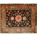Top view of the Serene Sanctuary Hand Knotted Area Rug featuring a beautifully intricate floral design in warm, earthy tones. This large living room rug showcases a vintage Persian style with vibrant flowers that add elegance and charm, perfect for enhancing any space.