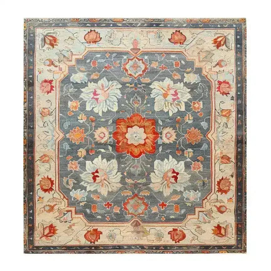 The Serenity Bloom Hand Knotted Area Rug features a stunning vintage design with intricate floral patterns and vibrant colors. Ideal for large living rooms, this Persian-style rug combines elegance and tradition, making it a perfect choice for those seeking a timeless floral rug.