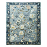 Serenity Garden Hand Tufted Wool Rug featuring a delicate floral design with soft hues of blue and cream, ideal as an area rug for large living rooms.