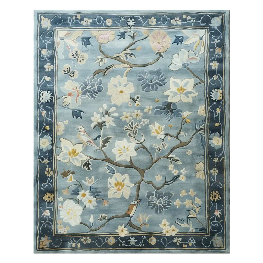 Serenity Garden Hand Tufted Wool Rug featuring a delicate floral design with soft hues of blue and cream, ideal as an area rug for large living rooms.