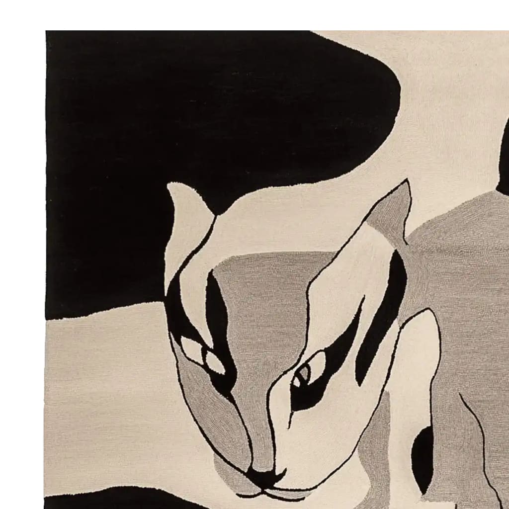 Close-up view of the Shadow Cat Mirage Hand Tufted Rug, featuring an abstract design of a cat in black, gray, and white tones. This contemporary wool area rug is perfect for adding a stylish touch to living room decor.