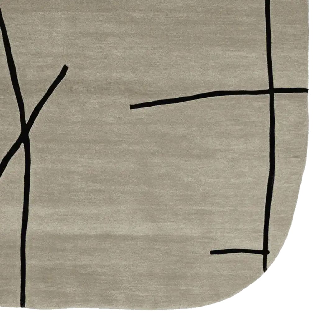 A contemporary Shadow Line Harmony Hand Tufted Area Rug featuring a minimalist abstract design with black lines on a neutral wool background, perfect for modern living rooms. This wool rug adds elegance and style to any space, making it an ideal choice for area rugs for living room settings.