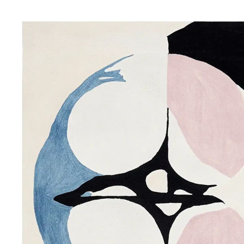 Close-up view of the Shadowline Divide Space Hand Tufted Area Rug, showcasing its contemporary abstract design with blue, pink, and black shapes. Perfect for adding a modern touch to living room area rugs, especially in an 8x10 size, this wool rug blends artistic flair with functionality.