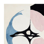 Close-up view of the Shadowline Divide Space Hand Tufted Area Rug, showcasing its contemporary abstract design with blue, pink, and black shapes. Perfect for adding a modern touch to living room area rugs, especially in an 8x10 size, this wool rug blends artistic flair with functionality.