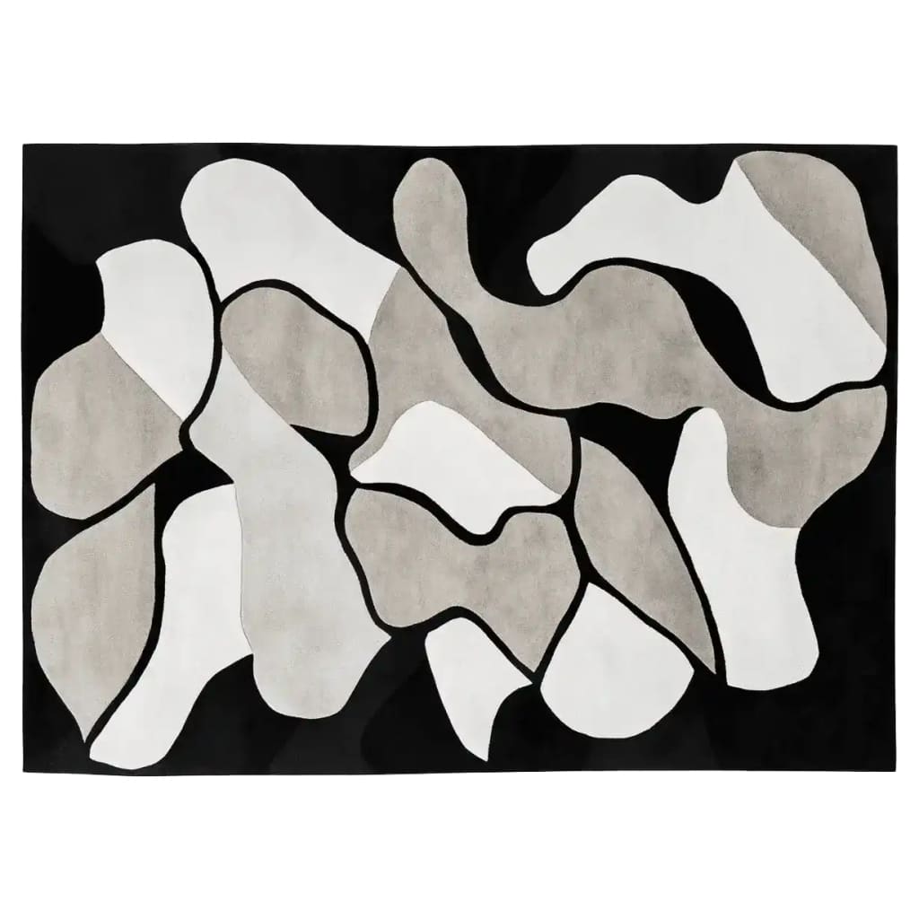 Contemporary Shadows in Motion hand-tufted area rug featuring an abstract design in shades of black, white, and gray. This wool rug is perfect for adding a modern touch to any living room, making it an ideal choice for those seeking stylish area rugs for their living space.