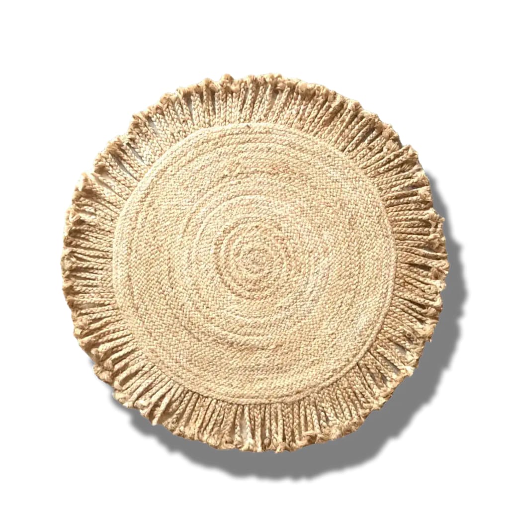 Top view of the Shala Fringed Natural Jute Rug, a beautiful round area rug perfect for a dining room. This large jute rug features a natural texture with a fringed border, ideal as a dining table rug to add warmth and style.