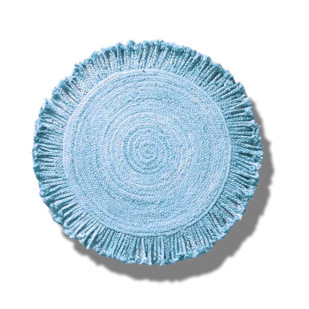 Top view of the Shala Fringed Natural Round Jute Rug in a soothing blue hue, perfect for adding a touch of elegance to your living room. This area rug is ideal for spaces needing an 8x10 living room rug, combining natural jute texture with a stylish fringe.