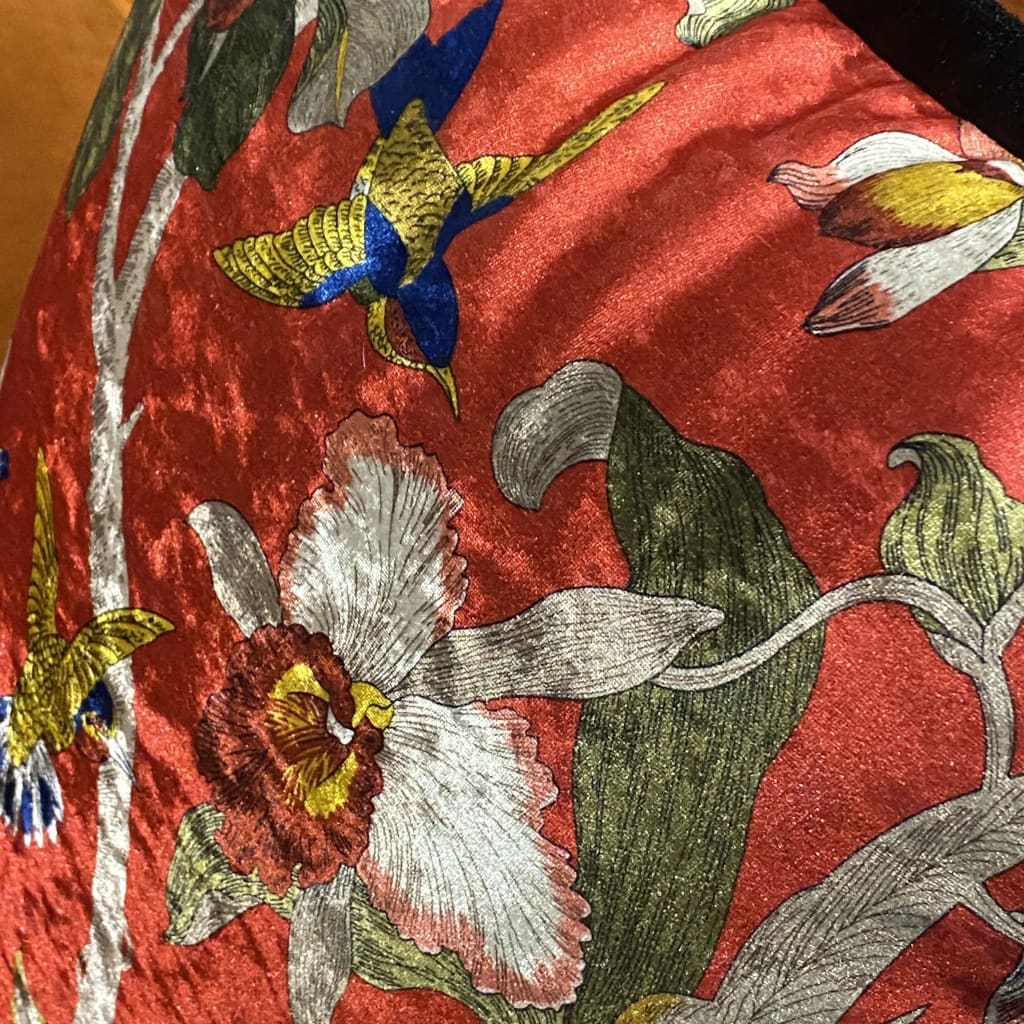 Shiny velvet scarlet throw pillow cover featuring intricate floral and bird designs, perfect for adding a touch of elegance to any home decor.