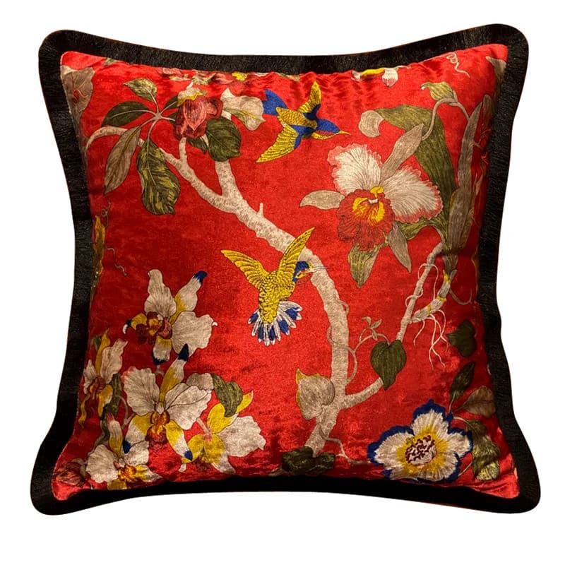 Shiny velvet scarlet throw pillow with floral and bird design, perfect for decorative accents in any living space.
