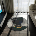 Silent Currents Round Rug in contemporary living room with dark floor, grey sofa, and balcony sunlight streaming in