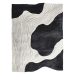 A contemporary area rug with an abstract black and white design, perfect for modern living rooms. This hand tufted wool rug features organic flowing lines, making it an ideal choice for an 8x10 living room space.