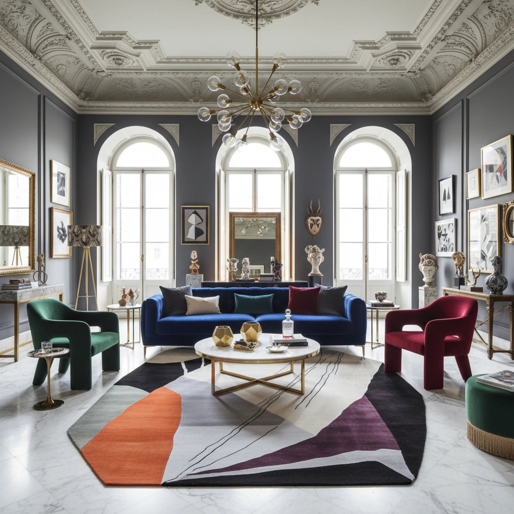 Modern living room with a blue sofa, colorful chairs, and decorative elements.