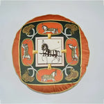 Round decorative throw pillow featuring intricate horse designs and vibrant colors, perfect for home decor.