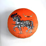 Round decorative throw pillow featuring a beautifully embroidered horse design on an orange background, perfect for adding a touch of elegance to any room.