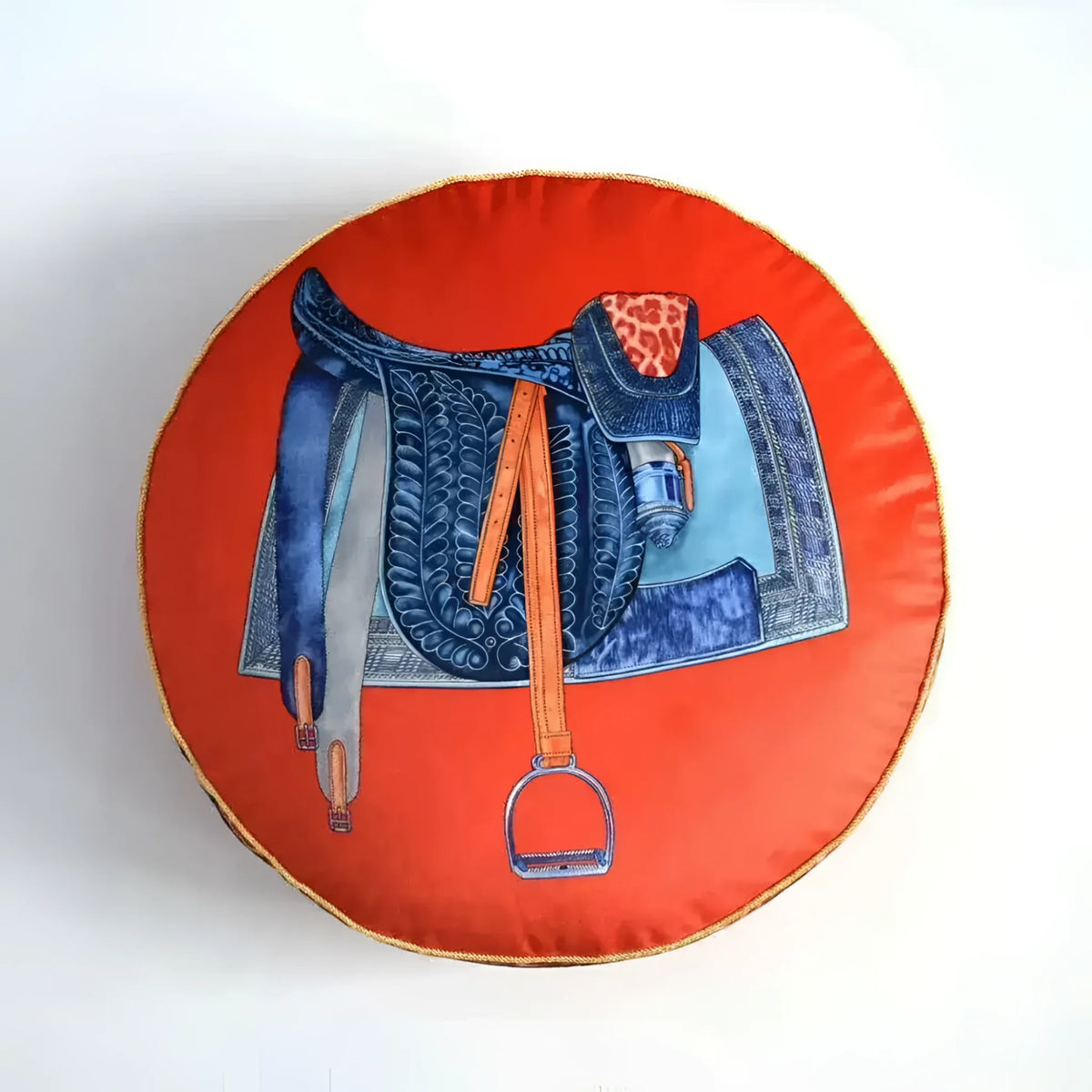 Round decorative throw pillow cover featuring a vibrant saddle design on a red background, perfect for horse lovers and home decor.