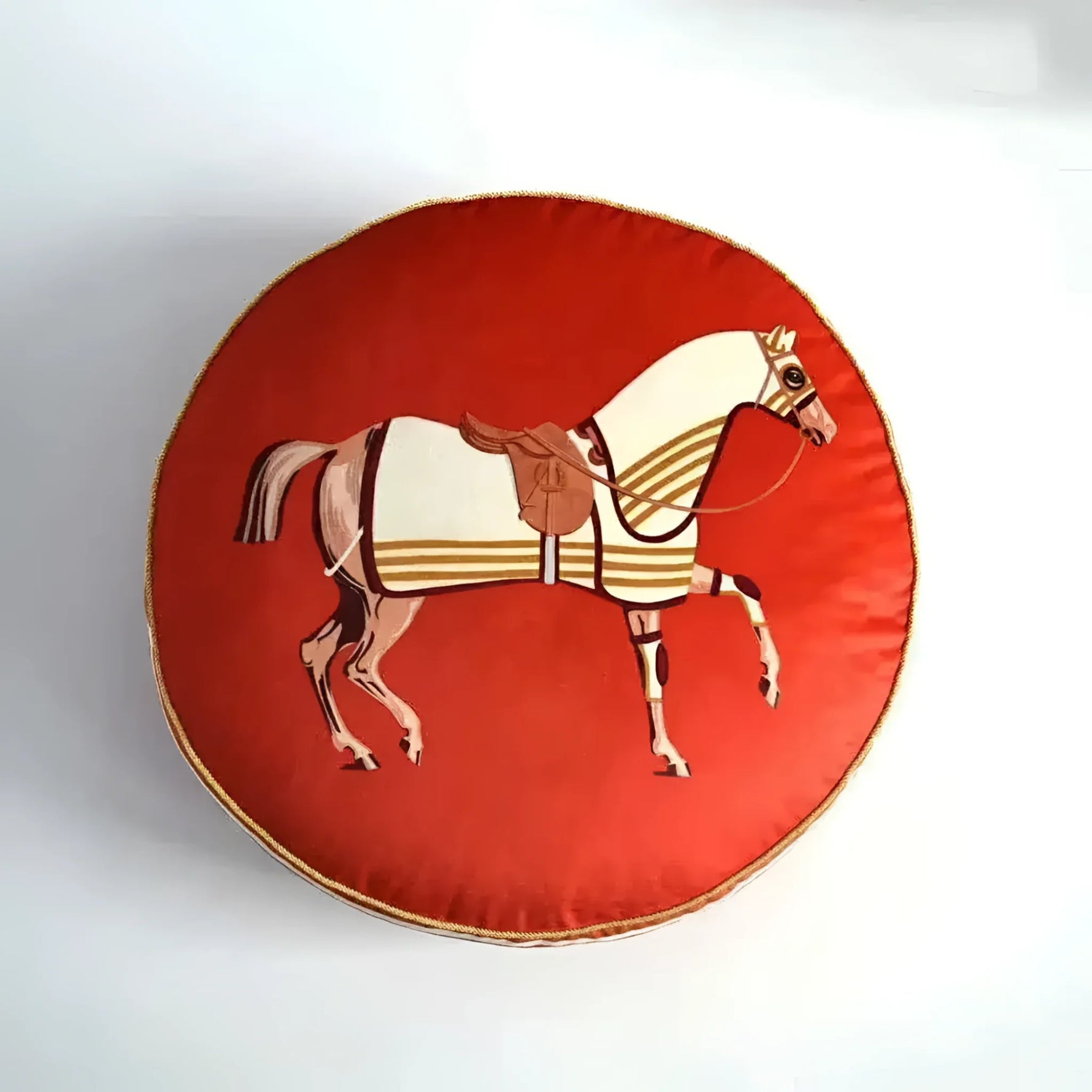 Round decorative throw pillow featuring a vintage-inspired horse design on a red background.