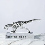 silver metallic Tyrannosaurus Rex Dinosaur Sculpture with skeleton detail on marble display base, side view