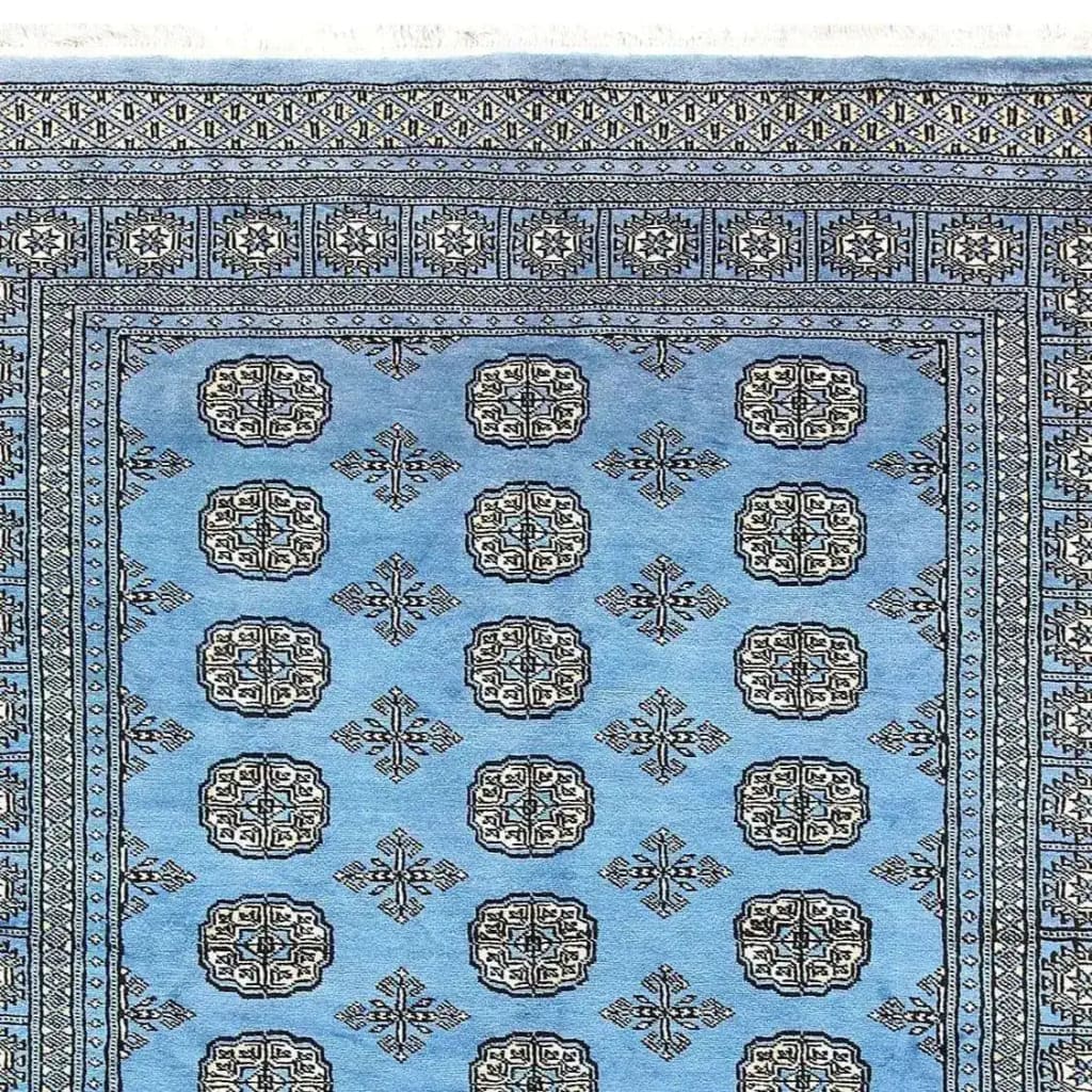 A beautifully intricate Sky Blue Anirudha Hand Knotted Area Rug featuring detailed geometric patterns in a soothing blue tone. Perfect for adding elegance to living room area rugs or as a standout piece in any rugs for living room collection.