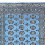 A beautifully intricate Sky Blue Anirudha Hand Knotted Area Rug featuring detailed geometric patterns in a soothing blue tone. Perfect for adding elegance to living room area rugs or as a standout piece in any rugs for living room collection.