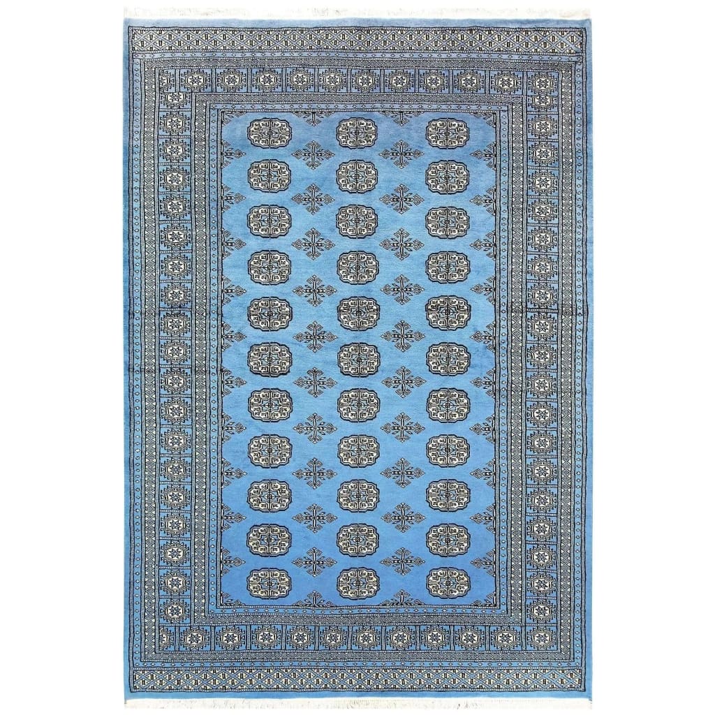 Sky Blue Anirudha hand-knotted area rug featuring intricate geometric patterns, perfect for elevating any living room space. This exquisite rug combines traditional craftsmanship with modern style, making it a standout choice among living room area rugs and rugs for living room decor.