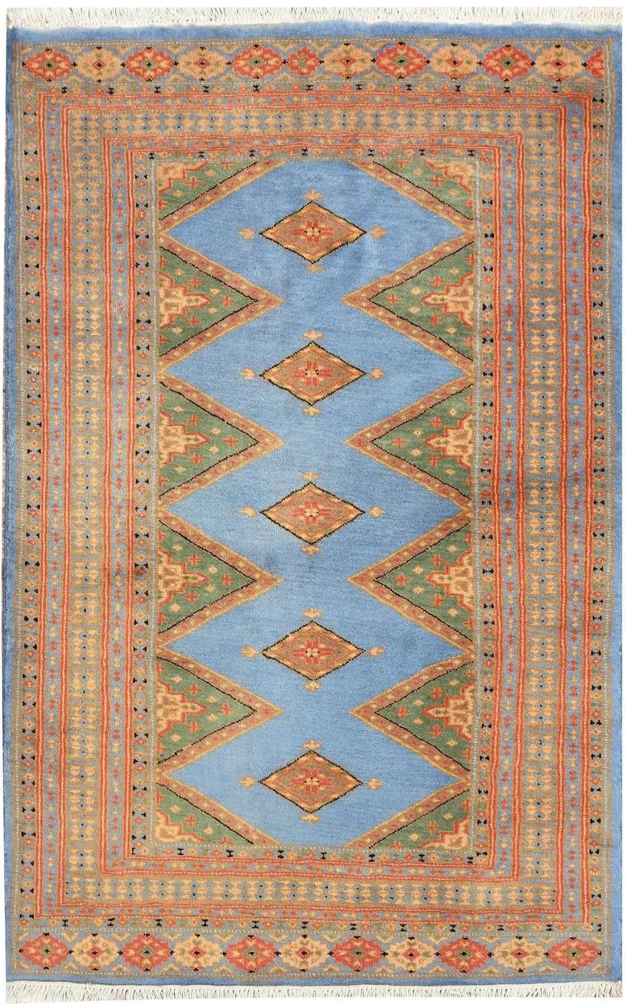 Sky Blue Java Kingdom Hand Knotted Area Rug featuring intricate geometric patterns in vibrant colors, ideal for enhancing the elegance of large living room spaces. Perfect choice for those seeking stylish rugs for living room decor.