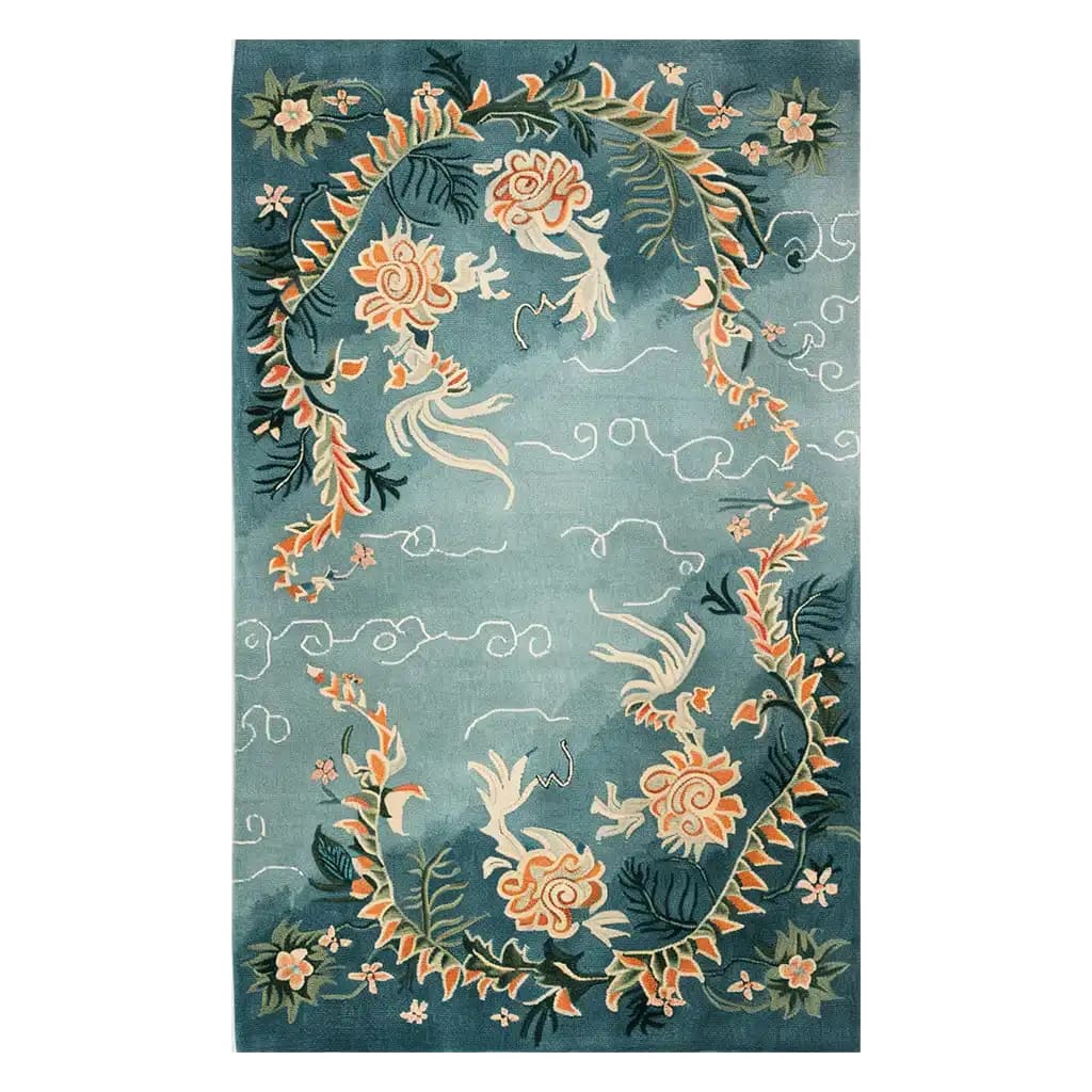 Skyward Blossom Knotted Wool Rug featuring an elegant floral design set against a calming blue background. This 8x10 area rug is perfect for enhancing the living room with its intricate patterns and soft wool texture, making it a standout choice among area rugs for living rooms.
