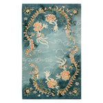 Skyward Blossom Knotted Wool Rug featuring an elegant floral design set against a calming blue background. This 8x10 area rug is perfect for enhancing the living room with its intricate patterns and soft wool texture, making it a standout choice among area rugs for living rooms.