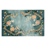 Skyward Blossom Knotted Wool Rug, an elegant area rug featuring intricate floral designs, perfect for adding a touch of sophistication to your living room. This 8x10 wool rug showcases a beautiful blend of colors and patterns, making it an ideal choice for area rugs in living spaces.