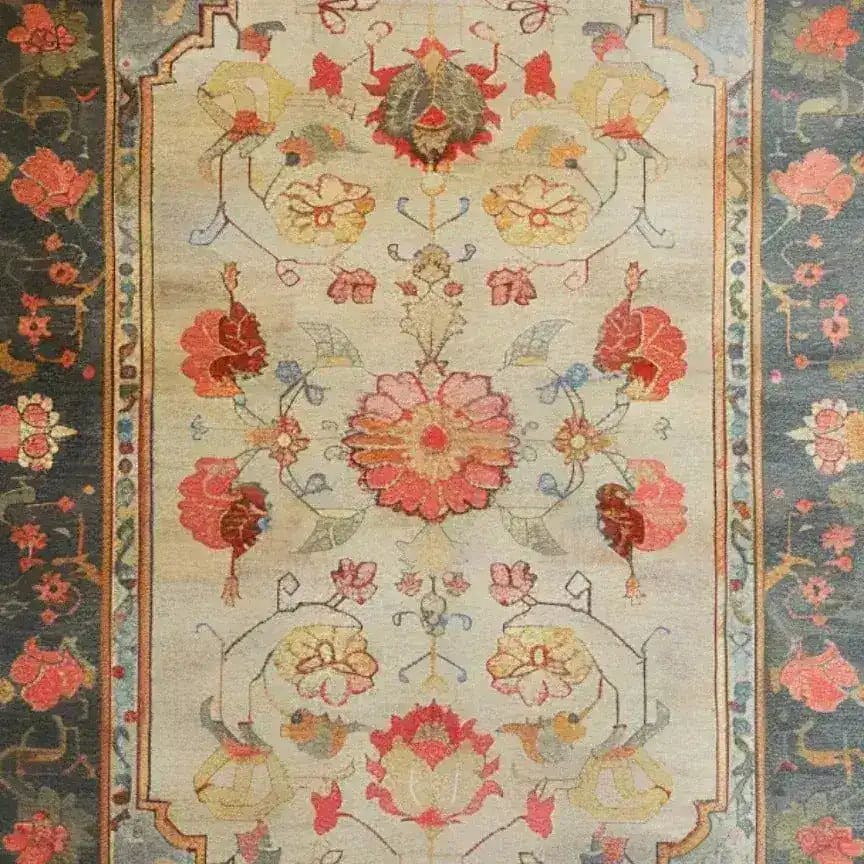 A beautifully crafted area rug with intricate floral designs, perfect for a large living room. This hand-knotted Persian rug features vibrant reds, yellows, and blues, creating an elegant and inviting atmosphere. Ideal for those seeking a floral rug in an 8x10 size.