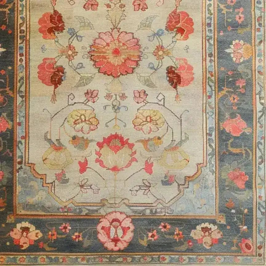 A beautifully detailed hand-knotted area rug showcasing a vibrant floral design. This large living room rug features intricate Persian-inspired patterns in rich, warm colors, perfect for adding elegance to any space. Ideal as a living room rug 8x10, its classic style enhances the home's decor.